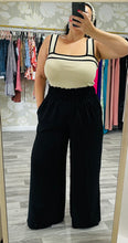 Load image into Gallery viewer, Smocked Black Palazzo Pants
